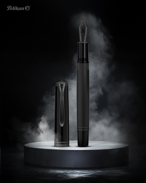 Pelikan Souverän M809 black matte fountain pen with gold accents and smooth grip section.