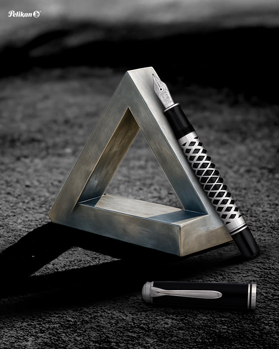Pelikan Souverän M805 fountain pen with a sleek metal sleeve, silver finish, and detailed nib visible in the image.