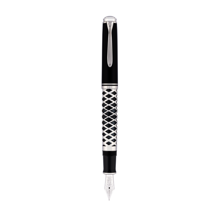 Pelikan Souverän M805 fountain pen with metal sleeve, featuring a sleek design and gold accents, displayed on a white background.