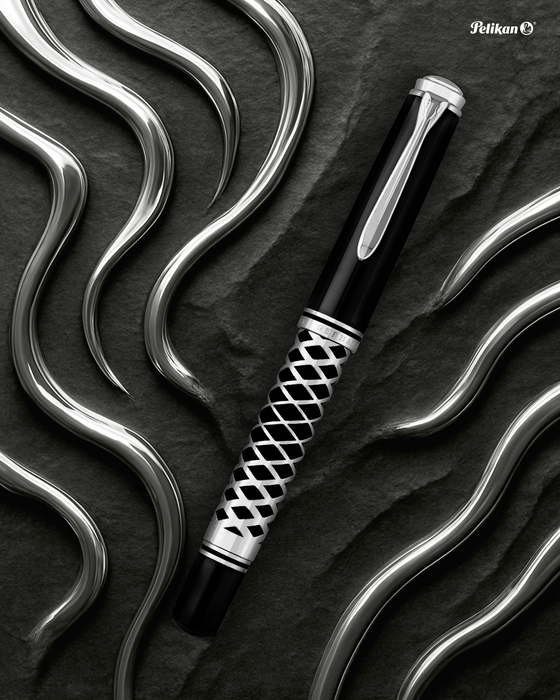 Pelikan Souverän M805 fountain pen with metal sleeve, showcasing its sleek design and gold accents on a white background.