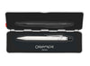 Caran D'Ache 849 rollerball pen with slim white barrel and silver clip, showcasing its sleek, compact design.