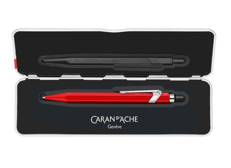 Red Caran D'Ache Roller Pen 849™ rollerball pen with slim profile and smooth ink flow.