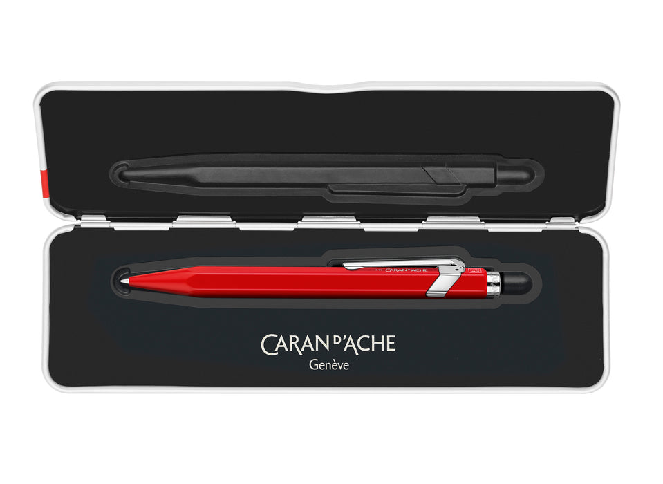 Red Caran D'Ache Roller Pen 849™ rollerball pen with slim profile and smooth ink flow.