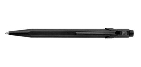 Caran D'Ache XL 849™ black ballpoint pen with sleek design and smooth writing tip, shown with black body and silver accents.
