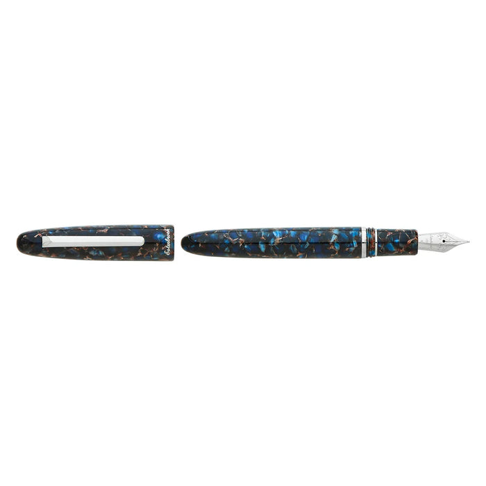Esterbrook Estie fountain pen with silver fittings, sleek black body, and gold accents, close-up view highlighting elegant design.