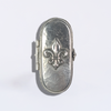 Le Potier D'Étain pewter nib box with Fleur De Lis design, showcasing intricate detailing on a vintage-style accessory.