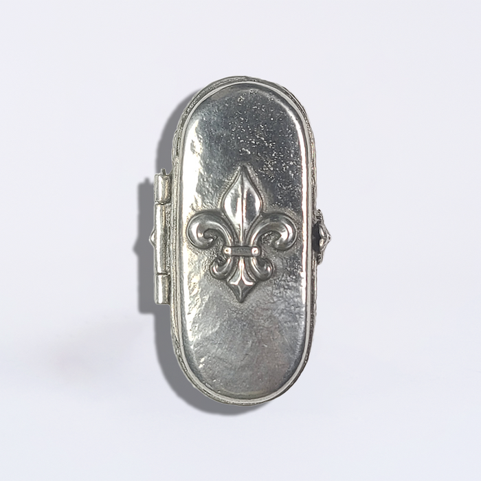 Le Potier D'Étain pewter nib box with Fleur De Lis design, showcasing intricate detailing on a vintage-style accessory.
