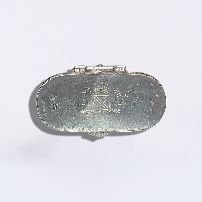 Le Potier D'Étain pewter nib box featuring a Fleur De Lis design, displayed on a neutral background.