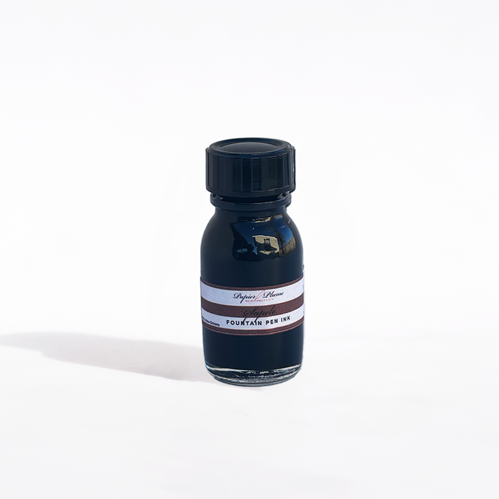 Papier Plume fountain pen ink set with 12 bottles of 15ml each, featuring vibrant ink colors for writing and calligraphy.