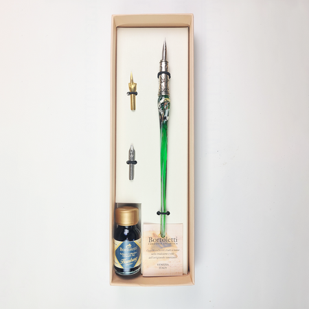 Bortoletti glass dipping pen set with 20 green pens, featuring elegant, colorful glass nibs for artistic calligraphy and drawing.