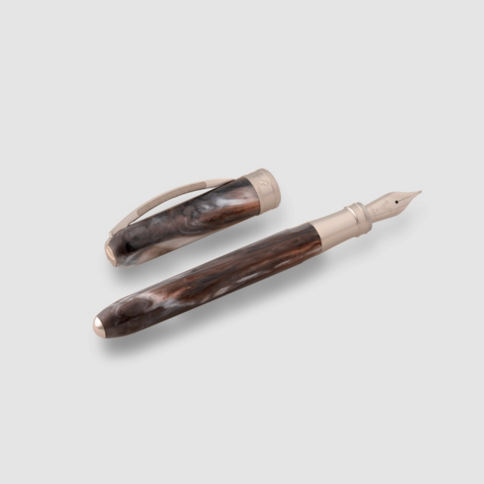 Visconti Comedia fountain pen with a sleek, dark-colored body and polished silver accents.