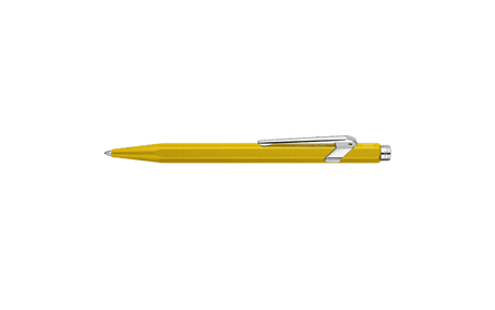 Caran D'Ache Ballpoint Pen 849 with yellow colored barrel and sleek design, ideal for smooth writing and everyday use