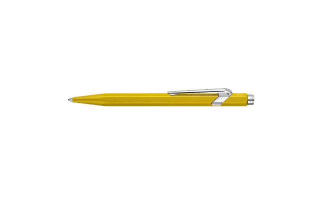Caran D'Ache Ballpoint Pen 849 with yellow colored barrel and sleek design, ideal for smooth writing and everyday use