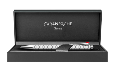 Caran D'Ache Platinum-Coated Ecridor Avenue rollerball pen with detailed close-up of the gold finish and engraved accents.