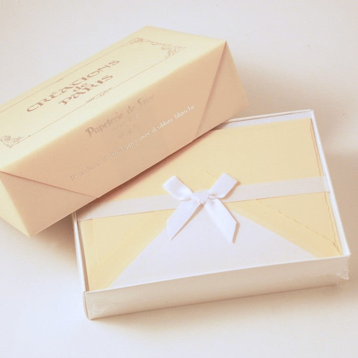 Cream flat deckled edge cards and lined envelopes by Rossi, elegant stationery for special occasions or correspondence.